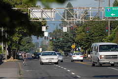 Person riding a bike on Rosa Parks Way